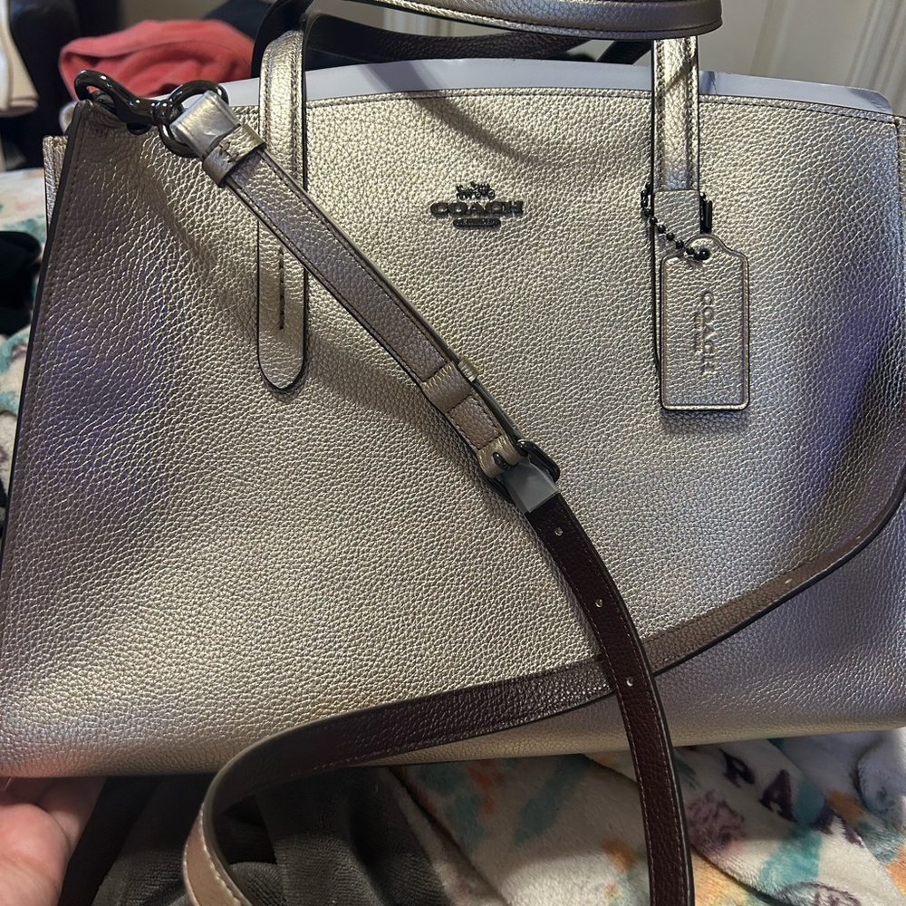 Coach handbag perfect for school or personal use.